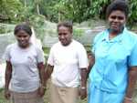 R0014570 Hilda Karani, the KGA technician, with some women farmers on attachment to learn about managing local chickens